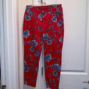 Red trousers with blue floral design by Roz & Ali